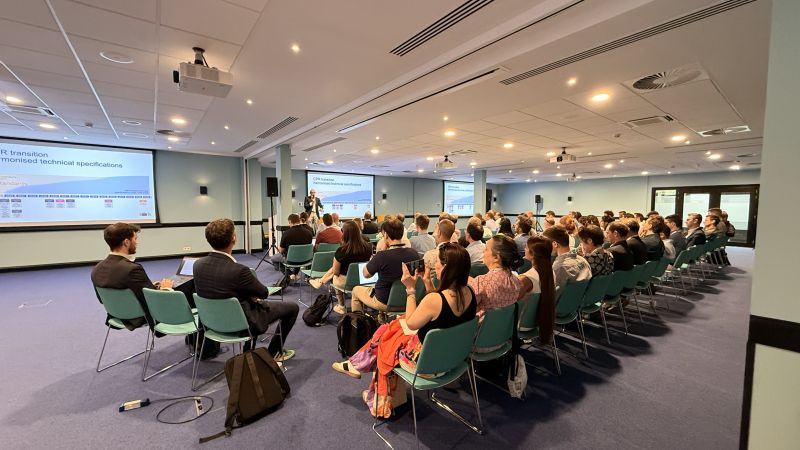 image of people listening to a talk in a meeting art BDTIC